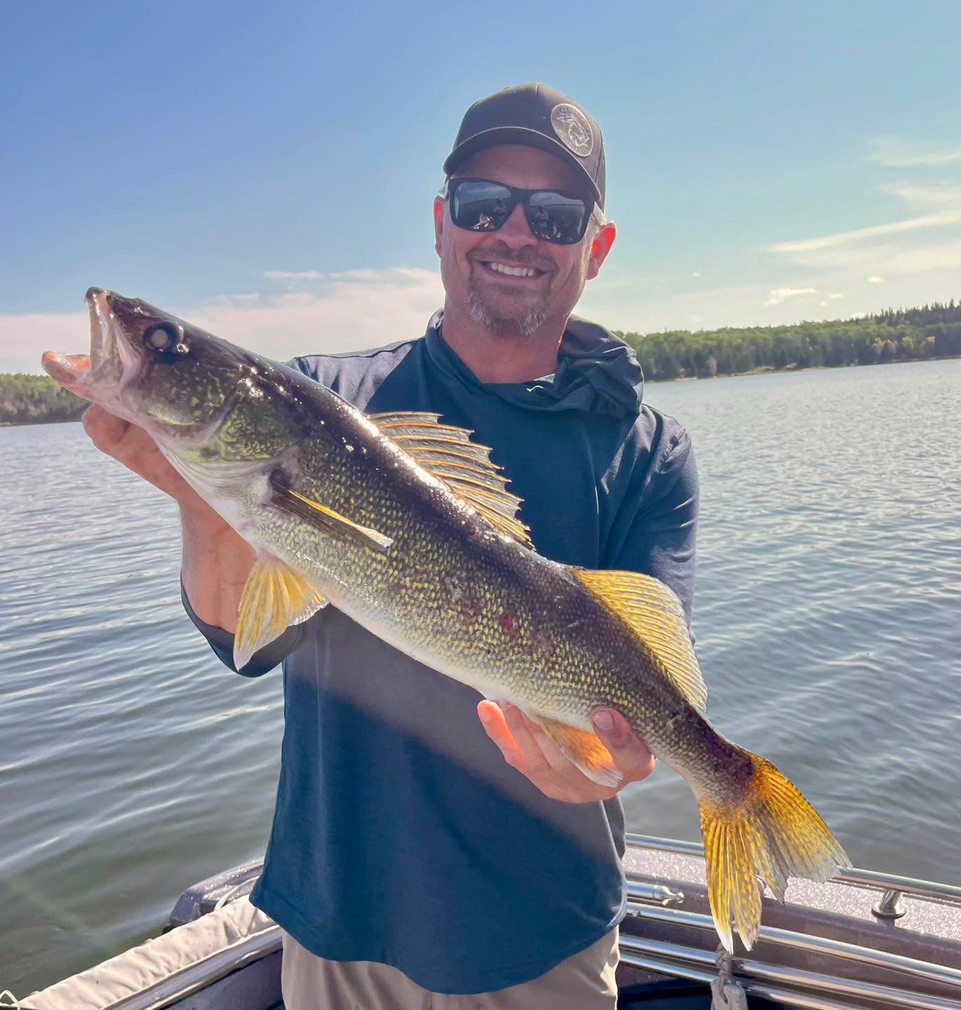 Dean Solem with a walleye at Canada