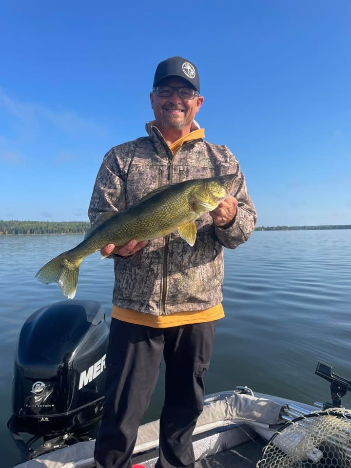 Dean Solem with a walleye at Canada