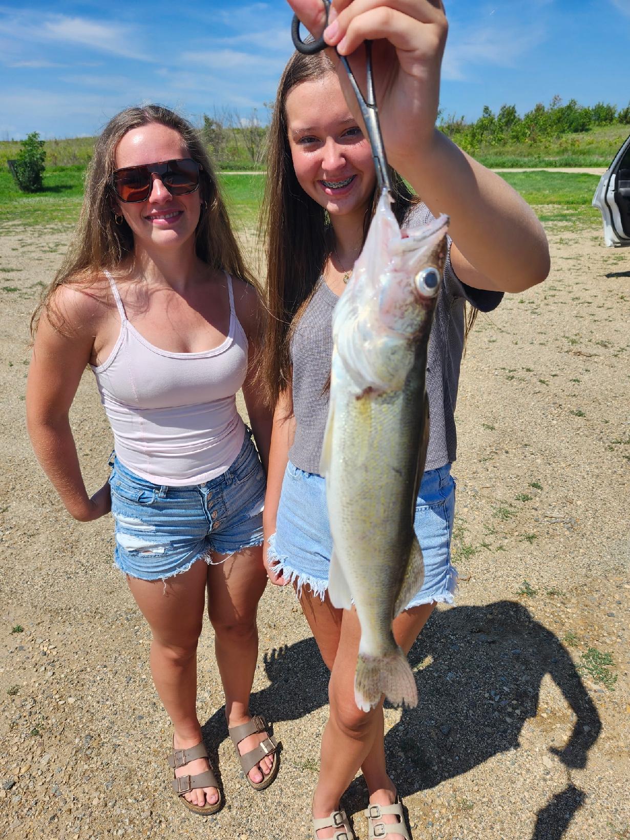 Troy Houselog with a walleye at Minnesota