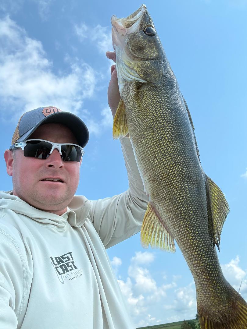 Zach Burns with a walleye at Minnesota